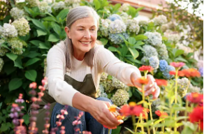 happy woman enjoying work life balance lifestyle in garden